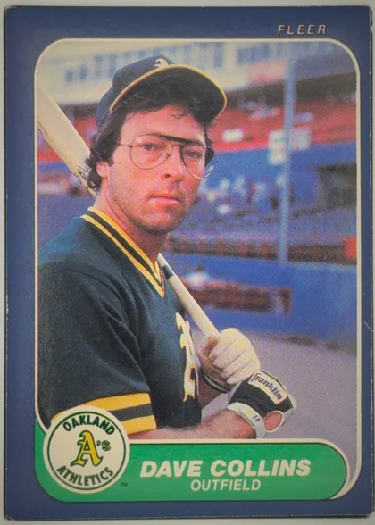 Front of 1986 Fleer Dave Collins #415 Base, front of a Fleer baseball card. A full-color action/portrait photo fills most of the card within a rounded-corner cream inner frame: a player…