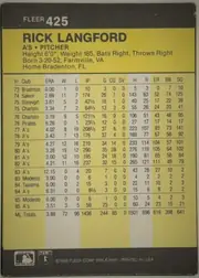 Back of 1986 Fleer Rick Langford #425 Base, portrait-oriented statistics back. A charcoal-gray header at the top contains the white FLEER logo and card number 425. Below it, a large yellow…