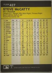 Back of 1986 Fleer Steve McCatty #427 Base, upright portrait-oriented statistics back. A black header band spans the top with white FLEER branding and card number 427 at upper left. A large…