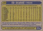 Back of 1987 Topps Ed Olwine #159 Base, landscape-oriented baseball card back. A blue header across the top reads “ED OLWINE • PITCHER,” with card number 159 in a yellow tab at upper left…