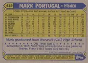 Back of 1987 Topps Mark Portugal #419 Base, upright landscape-oriented baseball card back. A blue-and-yellow arrow and banner design frames the card. The upper banner shows card number 419 at…