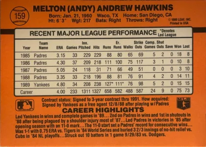 Back of 1990 Donruss Baseball Andy Hawkins #159 Base, orange baseball card back. The player name is printed prominently across the upper portion, with biographical details beneath it. A baseball-shaped…
