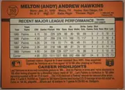Back of 1990 Donruss Baseball Andy Hawkins #159 Base, landscape-oriented baseball card back. An orange background surrounds a large cream statistics table bordered in black. The player name is printed…