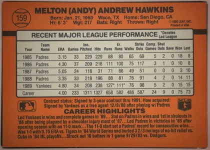 Back of 1990 Donruss Baseball Andy Hawkins #159 Base, landscape-oriented baseball card back. An orange background surrounds a large cream statistics table bordered in black. The player name is printed…