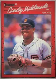 Front of 1990 Donruss Baseball Candy Maldonado #611 Base, portrait-oriented baseball card front. A large color photograph shows Candy Maldonado in a San Francisco Giants uniform and cap holding a glove. The…