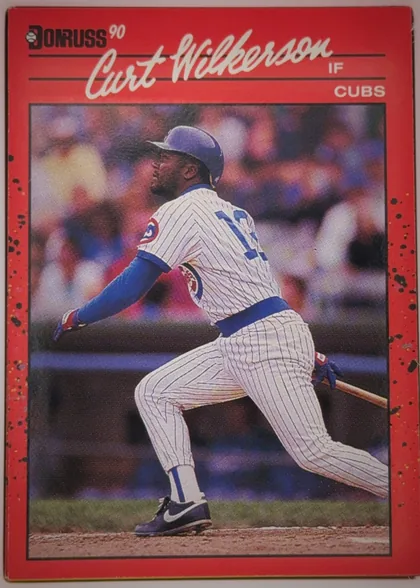 Front of 1990 Donruss Baseball CURTIS (CURT) VERNON WILKERSON #608, portrait-oriented baseball card front. A red border surrounds a large action photograph of Curt Wilkerson in a Chicago Cubs pinstriped uniform…