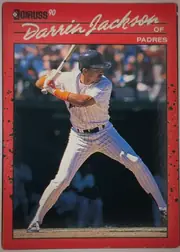 Front of 1990 Donruss Baseball DARRIN JAY JACKSON #641, portrait-oriented baseball card front. A red border surrounds a large action photograph of a Padres player batting. The upper area contains the…