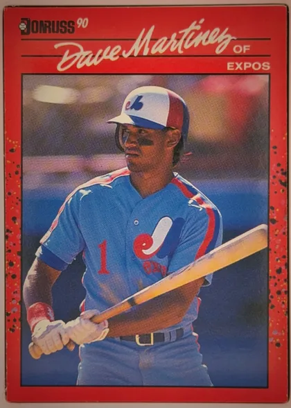 Front of 1990 Donruss Baseball Dave Martinez #452, portrait baseball card front. The upper left has the Donruss logo and printed 90. A large cream script name, Bruce Martinez, spans the upper…