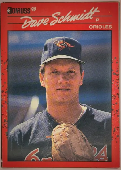 Front of 1990 Donruss Baseball David (Dave) Joseph Schmidt #524, upright portrait baseball card front. A red header carries the Donruss 90 logo at upper left, a large white script player name across the top, and…