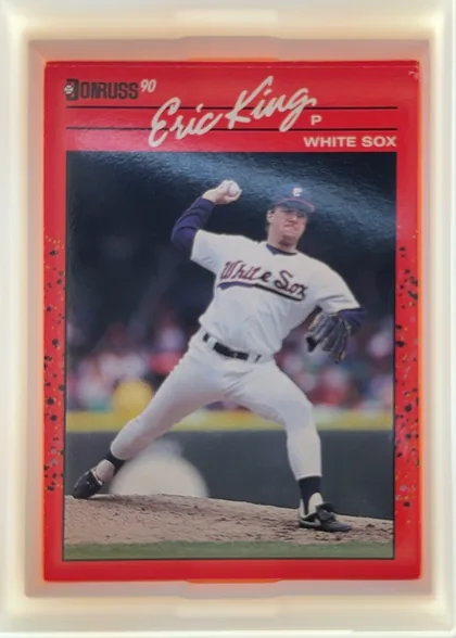 Front of 1990 Donruss Baseball Eric King #337, portrait baseball card front. A red border surrounds a large action photograph of a pitcher in a White Sox uniform. The upper area has the Donruss…
