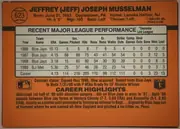 Back of 1990 Donruss Baseball Jeff Musselman #623 Base (DP), orange baseball-card back dominated by a black-printed player header across the top. A circular baseball graphic at upper left contains the number…