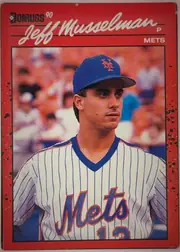 Front of 1990 Donruss Baseball Jeff Musselman #623 Base (DP), portrait baseball card front. A red speckled border surrounds a large centered portrait photograph of a player in a white pinstriped Mets uniform…