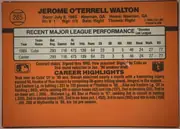 Back of 1990 Donruss Baseball Jerome O'Terrell Walton #285, landscape-oriented orange baseball card back. The upper area has a large black player name, a baseball-shaped number emblem at upper left…
