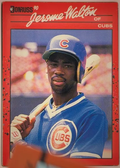 Front of 1990 Donruss Baseball Jerome O'Terrell Walton #285, portrait baseball card front. A red border surrounds a large color photograph of a Chicago Cubs player holding a bat. The Donruss 90 logo is at the…