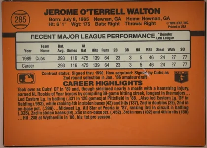 Back of 1990 Donruss Baseball Jerome Walton #285, landscape-oriented orange baseball card back. The upper orange band contains a baseball-shaped number graphic at left, the large player name across…
