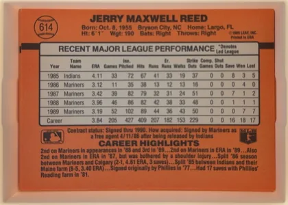 Back of 1990 Donruss Baseball Jerry Reed #614, landscape-oriented baseball card back dominated by an orange-red background. The player's name is centered across the top, with the card number…