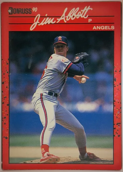 Front of 1990 Donruss Baseball Jim Abbott #108 Base, portrait baseball card front. The upper red header contains the Donruss logo and "90" at left, a large cream script name "Jim Abbott" across the top…