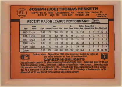 Back of 1990 Donruss Baseball Joe Hesketh #511, landscape-oriented orange baseball card back. A baseball graphic at upper left contains the number 511. The bold player name spans the upper area…