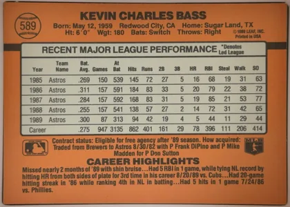 Back of 1990 Donruss Baseball Kevin Bass #589 Base, landscape-oriented baseball card back. A large orange field surrounds a centered light-gray statistics panel. The player name is printed prominently…