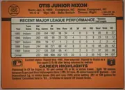 Back of 1990 Donruss Baseball Otis Nixon #456, portrait-oriented baseball card back dominated by an orange field. The player name appears in bold black capitals across the top, with biographical…