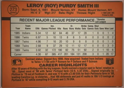 Back of 1990 Donruss Baseball Roy Smith #273 Base, upright landscape-format orange baseball card back. A baseball graphic containing card number 273 appears at upper left. The player name is printed…