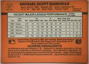 Back of 1990 Donruss Baseball Scott Bankhead #261, landscape-oriented orange card back. The player name is printed in large black uppercase type across the top, with biographical details beneath it…