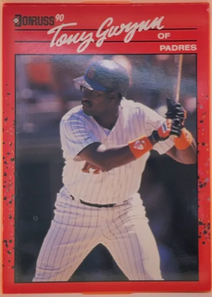 Front of 1990 Donruss Baseball Tony Gwynn #86, portrait-oriented baseball card front. A large color action photograph shows Tony Gwynn batting in a Padres uniform. The top area has a black…