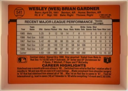 Back of 1990 Donruss Baseball Wes Gardner #541, upright landscape-oriented baseball card back. The upper orange-red area contains a baseball-shaped number emblem with 541 at left, the bold player…