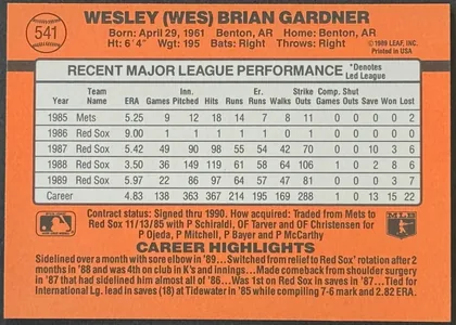 Back of 1990 Donruss Baseball Wes Gardner #541 Base, landscape-oriented baseball card back dominated by an orange field. A circular baseball graphic at upper left contains the number 541. The player's…