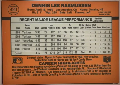 Back of 1990 Donruss Dennis Lee Rasmussen #420, upright landscape-oriented baseball card back. An orange field surrounds a large cream statistics table with black borders. The top header…