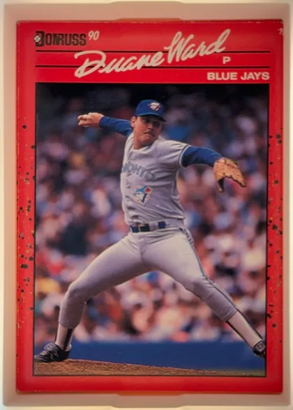 Front of 1990 Donruss Duane Ward #307, portrait baseball card front. A red header contains the Donruss logo and "90" at upper left, a large white script player name across the top, and…