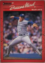 Front of 1990 Donruss Duane Ward #307 Base (pack-issued), portrait baseball card front. A large color action photograph shows a Blue Jays pitcher in a throwing stance. The upper red title area contains the…