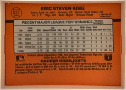 Back of 1990 Donruss Eric King #337, upright landscape-oriented baseball card back. An orange field surrounds a large light-gray statistics table. The card number 337 appears inside a…