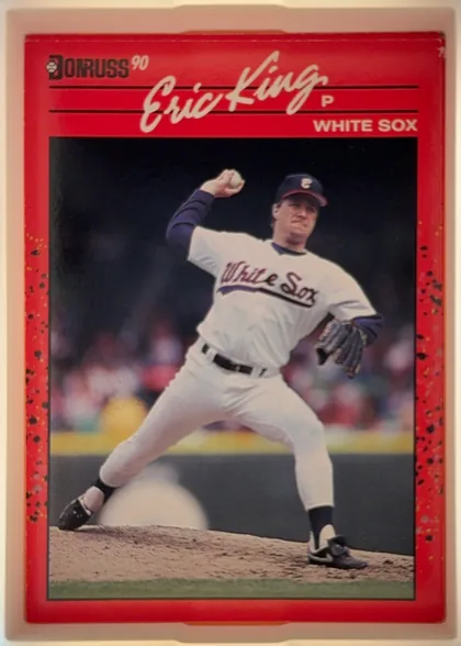 Front of 1990 Donruss Eric King #337, portrait baseball card front. A red header contains the Donruss logo at upper left, the large cream script name "Eric King" across the top, and "P"…
