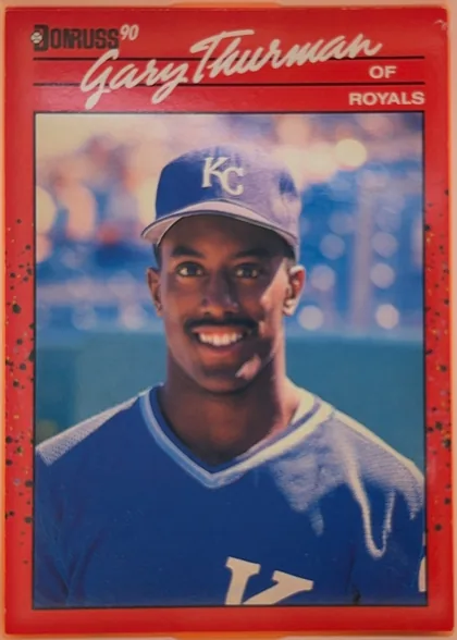 Front of 1990 Donruss Gary Thurman #416, portrait baseball card front. The upper area has a red speckled background, a black Donruss logo at upper left, a large white script name reading…