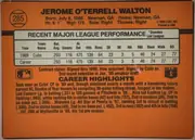 Back of 1990 Donruss Jerome Walton #285, upright landscape-oriented baseball card back. An orange field surrounds a large white statistics panel. The upper-left contains a baseball-shaped…