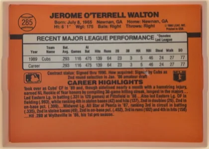 Back of 1990 Donruss Jerome Walton #285, upright landscape-oriented baseball card back dominated by an orange background. The player's name is centered across the top, with biographical…