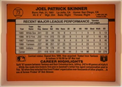 Back of 1990 Donruss Joel Skinner #73, back of a baseball card on an orange field. Top center: bold black name 'JOEL PATRICK SKINNER'. Below it a black info line: Born, home, height…