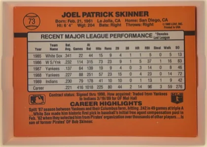 Back of 1990 Donruss Joel Skinner #73, landscape-oriented baseball card back dominated by an orange field. The player's name is centered across the top, with biographical details beneath…