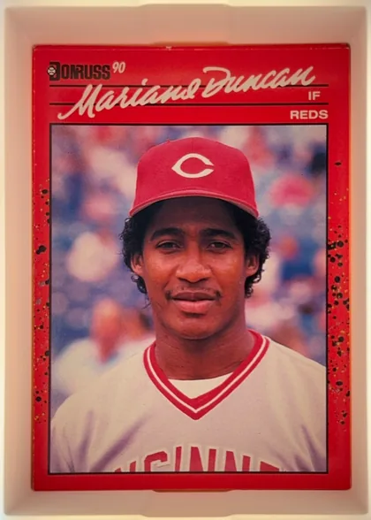 Front of 1990 Donruss Mariano Duncan #684, upright portrait-oriented baseball card front. The black Donruss logo and "90" appear at upper left. A large cream script player name, "Mariano…
