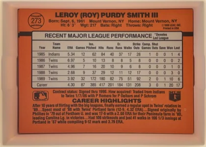 Back of 1990 Donruss Roy Smith #273, landscape-oriented baseball card back on an orange-red background. The player name is printed prominently across the top, with biographical…
