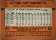 Back of 1990 Donruss Tony Gwynn #86 Base, upright landscape-oriented card back. An orange design fills the card. The upper area names Anthony (Tony) Keith Gwynn and lists biographical…