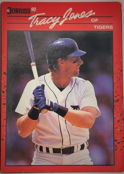 Front of 1990 Donruss Tracy Jones #636, portrait-oriented baseball card front. The upper left has the Donruss logo and "90". A large white script player name, "Tracy Jones," spans the…