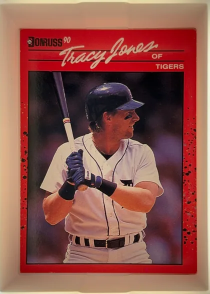 Front of 1990 Donruss Tracy Jones #636, portrait-oriented baseball card front. The upper red header contains the Donruss 90 logo at left, a large white script "Tracy Jones" across the top…