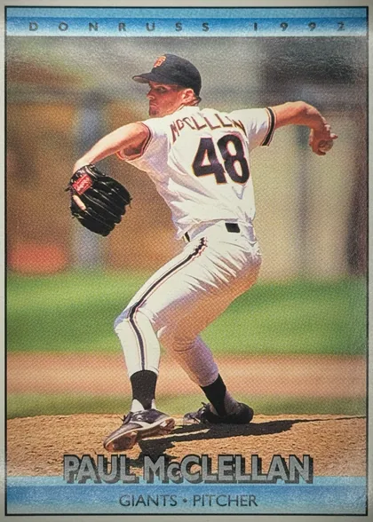 Front of 1991 Donruss Baseball Cards Checklist 507-604 #700, upright portrait baseball card front. A pitcher in a white Giants uniform, number 48, is shown throwing in a stadium. The top blue band reads…