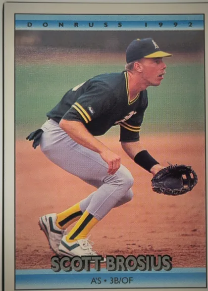 Front of 1991 Donruss Baseball Cards Joe Klink #591, front of a portrait baseball card. A color action photograph shows a player in an Oakland A's uniform crouching on the infield with a glove. DONRUSS…
