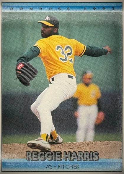 Front of 1991 Donruss Baseball Cards Reginald Allen Harris #781 Base, portrait baseball card front. A right-handed pitcher in an Oakland A's home uniform (yellow jersey with gray number 32, white pants, gray cap with…