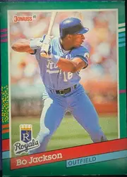 Front of 1991 Donruss Bo Jackson #632 Base, portrait baseball card front. A color action photo shows Bo Jackson mid-batting swing in a blue Kansas City Royals home uniform (jersey number 10…