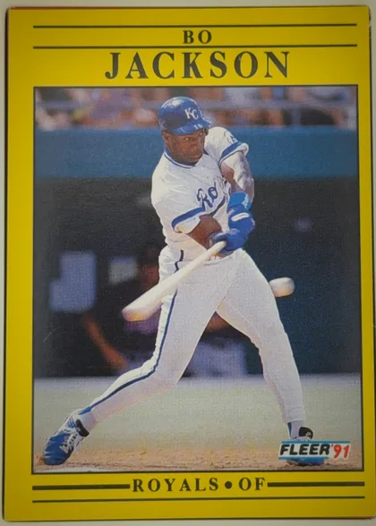 Front of 1991 Fleer Bo Jackson #561 1991 Fleer Bo Jackson #561, portrait-oriented baseball card front. A large color action photograph shows Bo Jackson batting in a Kansas City Royals uniform and helmet. The name…