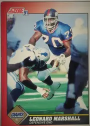 Front of 1991 Score Football Cards Leonard Marshall #170 Base, front of a football card. Top-left corner shows the red 'SCORE' wordmark logo with a small registered-mark symbol and a blue box containing '91'…